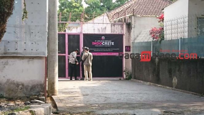 
 PT. Loka Abadi Sentausa (Indocrete) di Jalan Gajahmada Kecamatan Klojen Kota Malang, tertutup untuk media, Saat digeledah ditreskrimsus polda jatim (Rohim Alfarizi)