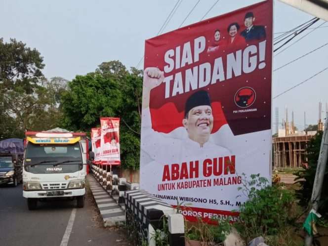 
 Baliho Abah Gunawan yang terpasang di salah satu sudut kecamatan di Kabupaten Malang. (ist) 