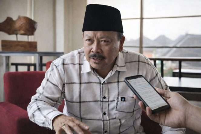 
 Anggota Fraksi PDIP DPRD Kabupaten Malang, Busilan saat memberikan pernyataan kepada wartawan. (ist)