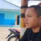 Koordinator BGN Pujon, Wisam Zuhdi, saat tengah diwawancarai awak media soal keberhasilan Program MBG. (Yan)