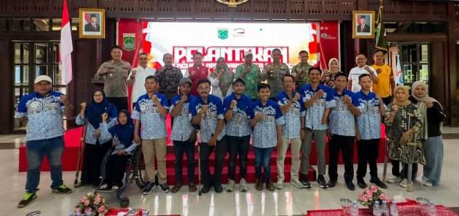 
 Berfoto bersama dalam kegiatan pelantikan  Pengurus National Paralympic Committee Indonesia (NPCI) Kabupaten Malang Masa Bakti 2026–2031. (Agus for bacamalang)