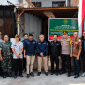 Panitera dan Juru Sita PN Malang, Danramil, serta Kapolsek Klojen bersama kuasa hukum pemohon eksekusi usai pelaksanaan eksekusi. (ist)