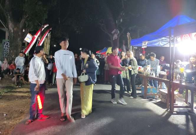 
 Pengunjung AMKOFEST yang digelar di kawasan BUMDesa Amanah Amadanom, Kecamatan Dampit, Kabupaten Malang, Sabtu (8/8/2026). (ist)
