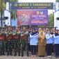 Berfoto bersama usai kegiatan kolaboratif Brigade Parako 2 Pasgat, Yon Parako 472 Pasgat, dan Denmatra 2 Pasgat di Musala Nur Hidayah, Desa Krajan, Pakis, serta SDN 4 Tamanharjo, Singosari. (Website TNI AU)