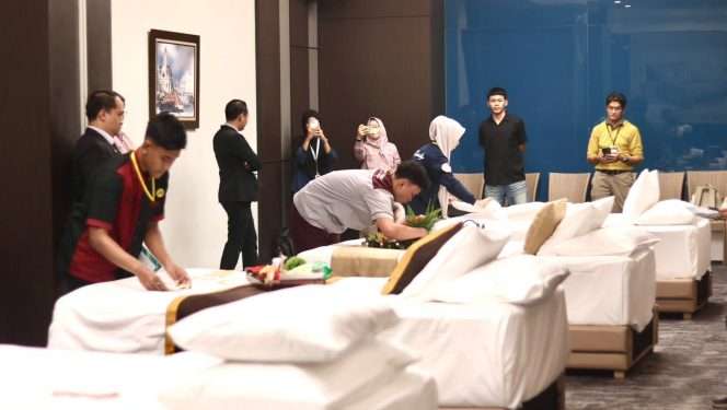 
 Bed Making Competition kompetisi antar siswa SMK Se-Jawa Timur memeriahkan hari jadi ke-13, Hotel THE 1O1 Malang OJ , Sabtu (19/9/2026). (ist)
